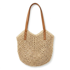 Bolsa de praia de palha bege vazada com duas alças de ombro