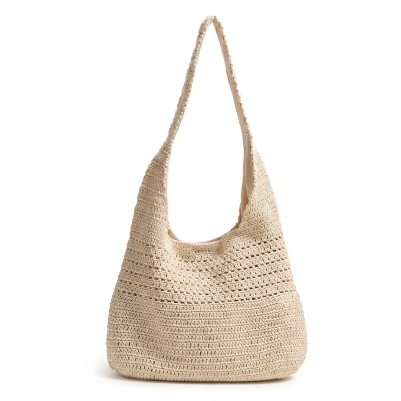 Bolsa de praia de crochê bege vazada vista de frente